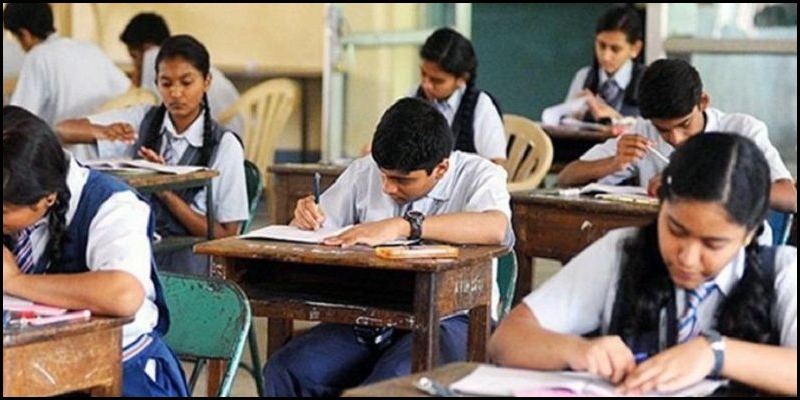 students writing 10th public exams