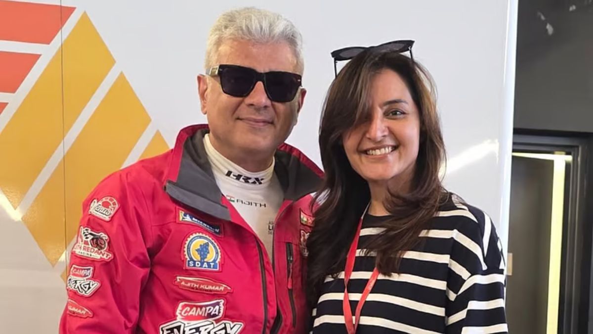 Actress Manju Warrier observing the Ajith Kumar Racing team setup at Dubai Autodrome in February 2026.