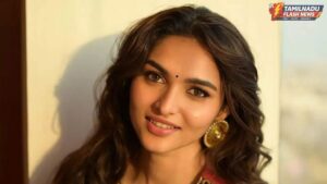 South Indian actress Kayadu Lohar in a beautiful yellow ethnic outfit posing for a photoshoot.