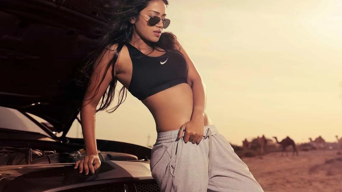 Nivetha Pethuraj driving her Dodge Challenger S/T muscle car in Dubai.