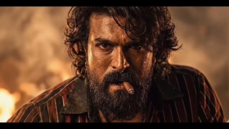 Official promotional poster of actor Ram Charan in a rugged look for the movie Peddi.