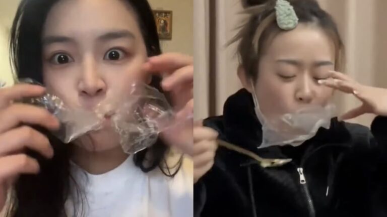 Person demonstrating cling wrap over mouth while chewing food in viral diet trend