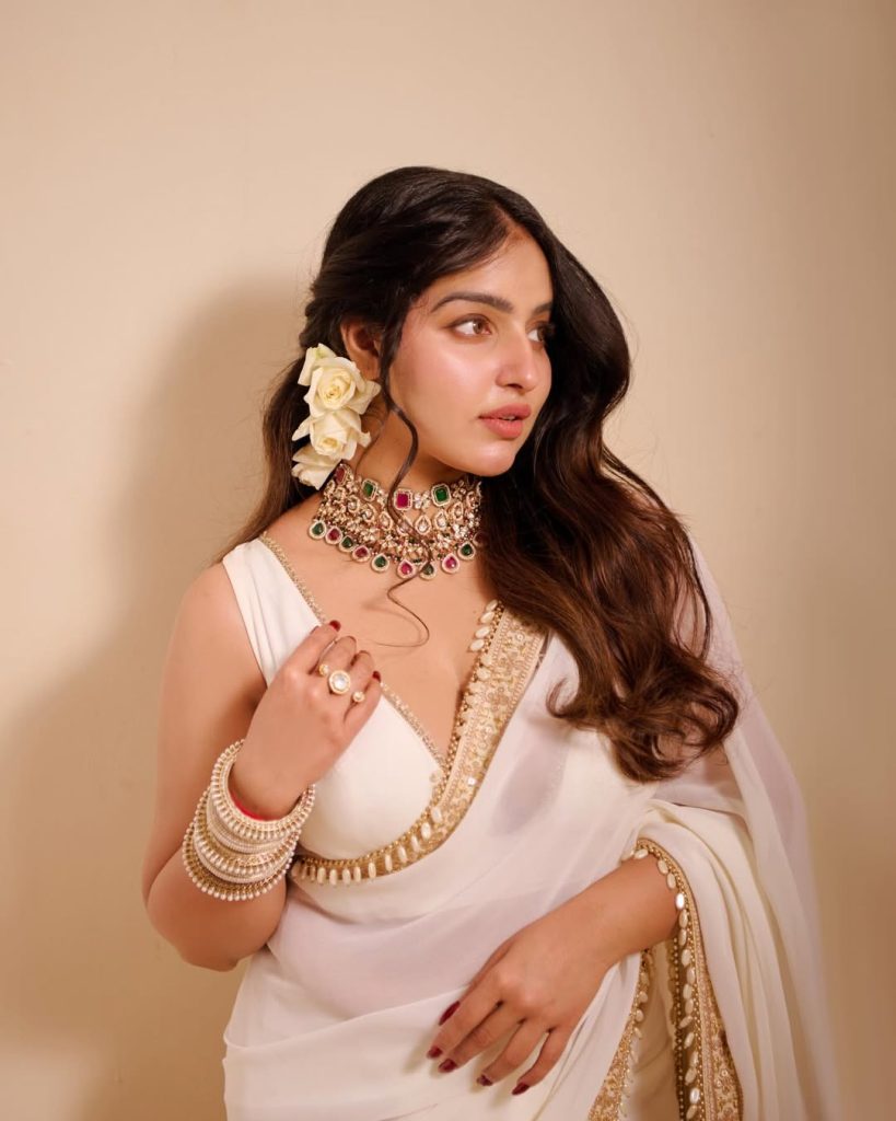 Official glamorous photoshoot of actress Malavika Menon in vibrant ethnic attire for 2026.