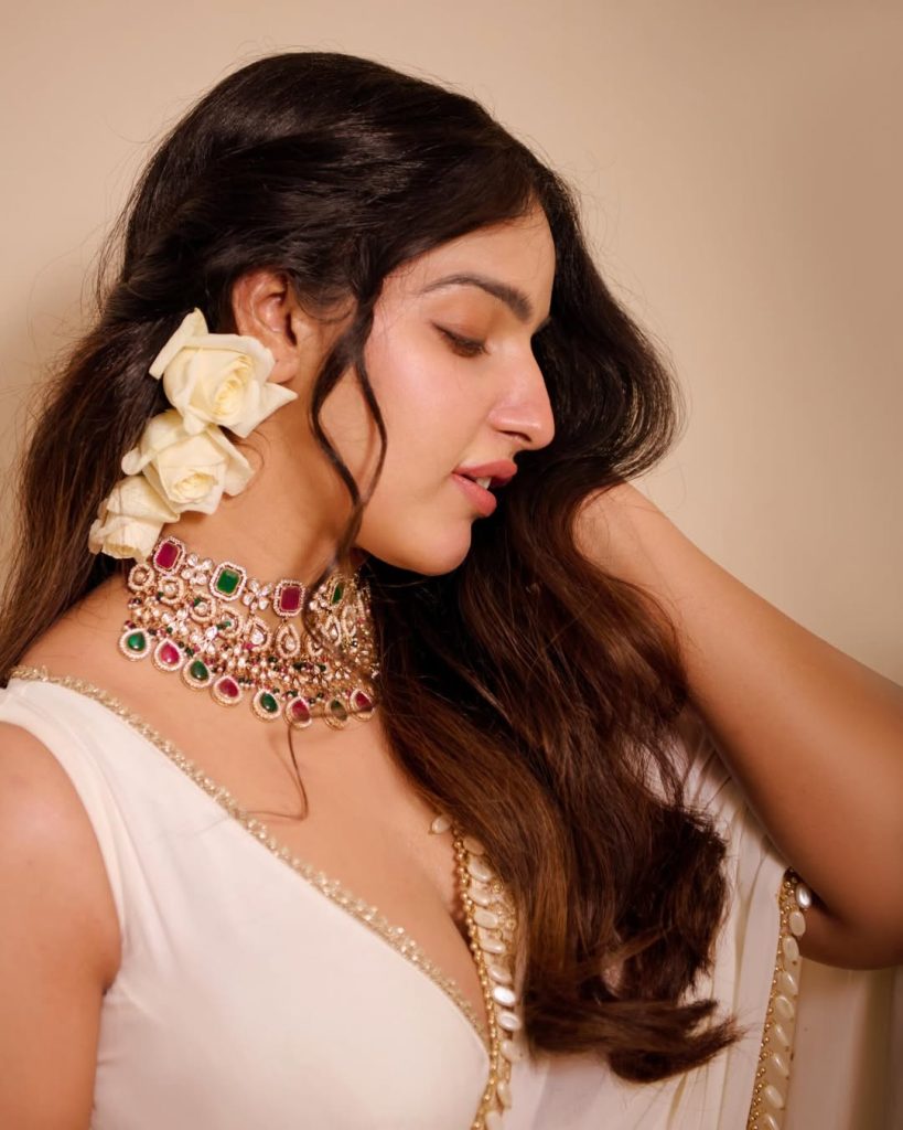 Official glamorous photoshoot of actress Malavika Menon in vibrant ethnic attire for 2026.