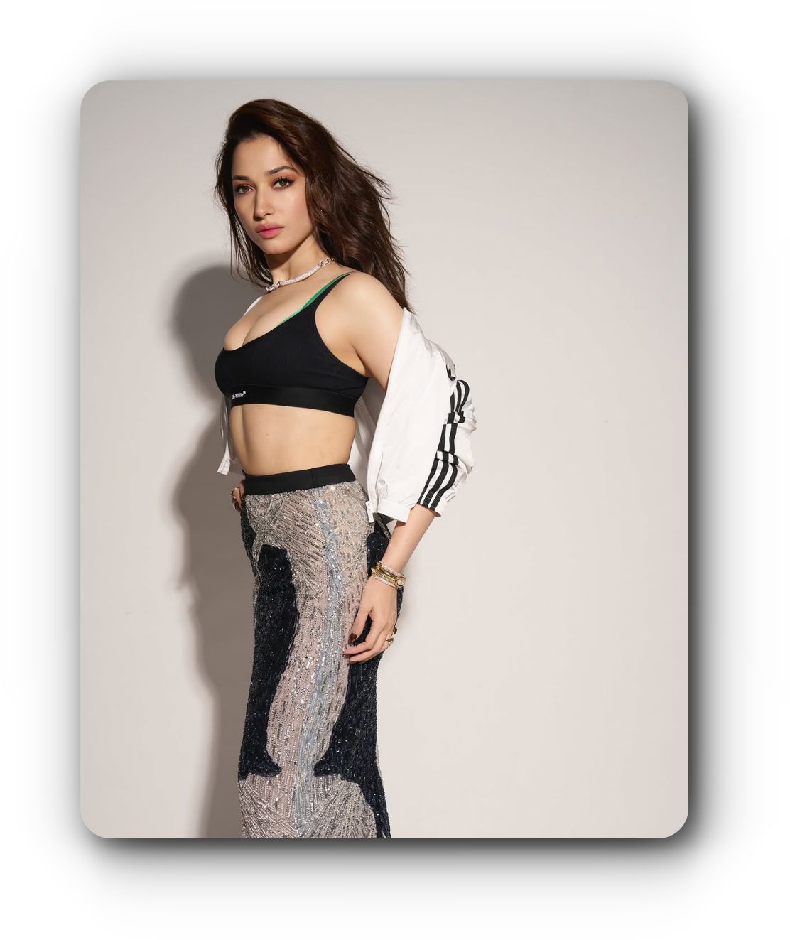 Portrait of Tamannaah Bhatia celebrating 20 years in the film industry.