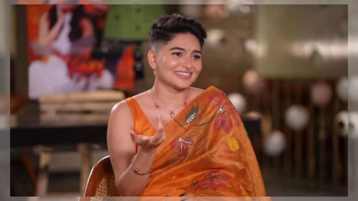 Actress Kayadu Lohar reacting to her viral AI generated undercut hairstyle photo in an interview.