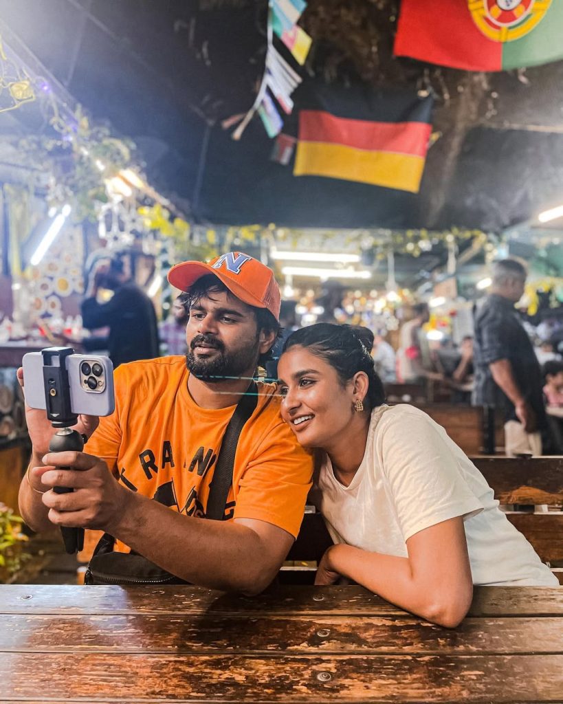 Tamil television actors Reshma Muralidharan and Madhan Pandian posing together for an official media event.