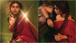 South Indian actress Dushara Vijayan posing gracefully in an elegant red color saree paired with a stylish black blouse for her latest Instagram photoshoot.
