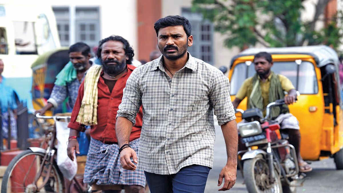 A high-octane cinematic still featuring Dhanush and Suraj Venjaramoodu from the critically acclaimed interval block of the movie Kara.