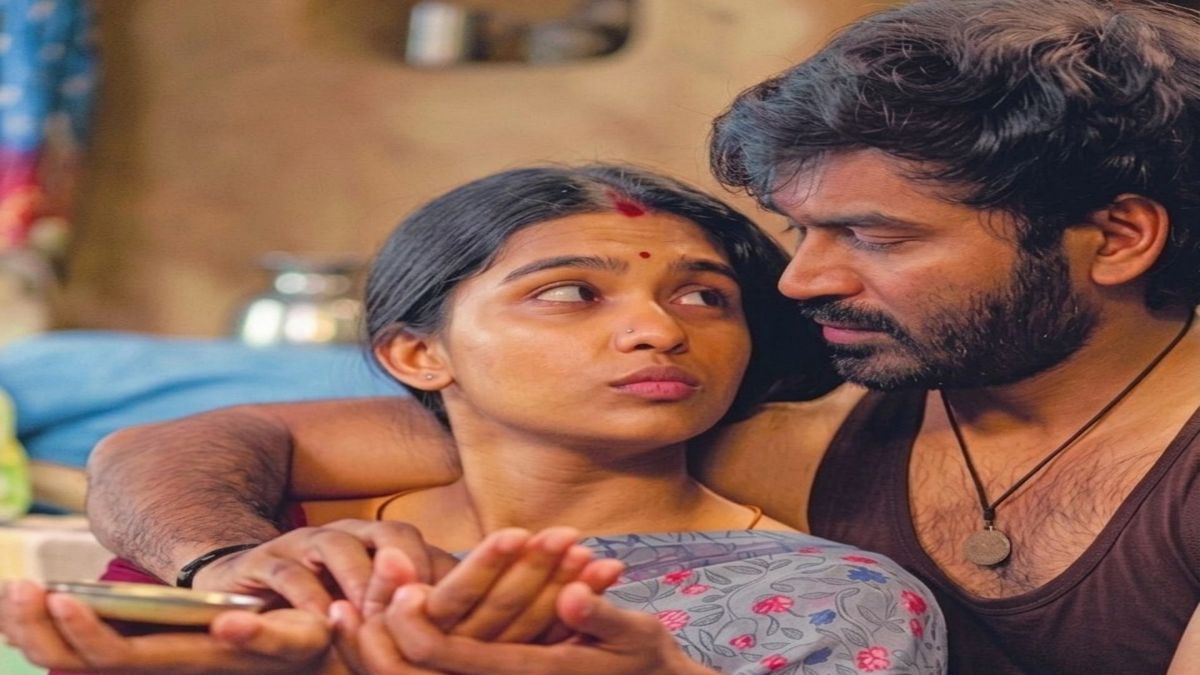 A movie review poster of Dhanush's Kara featuring key highlights like 'Intense Heist Thriller' and 'Terrific Performance'.