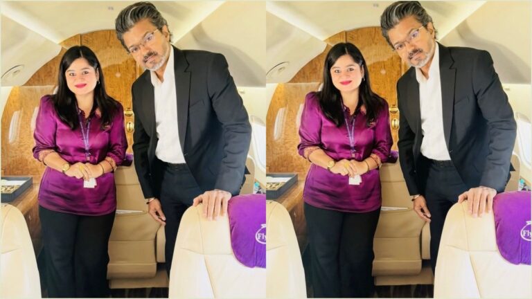 Tamil Nadu Chief Minister C Joseph Vijay posing for a photo with airhostess Meenakshi Uma during flight travel.