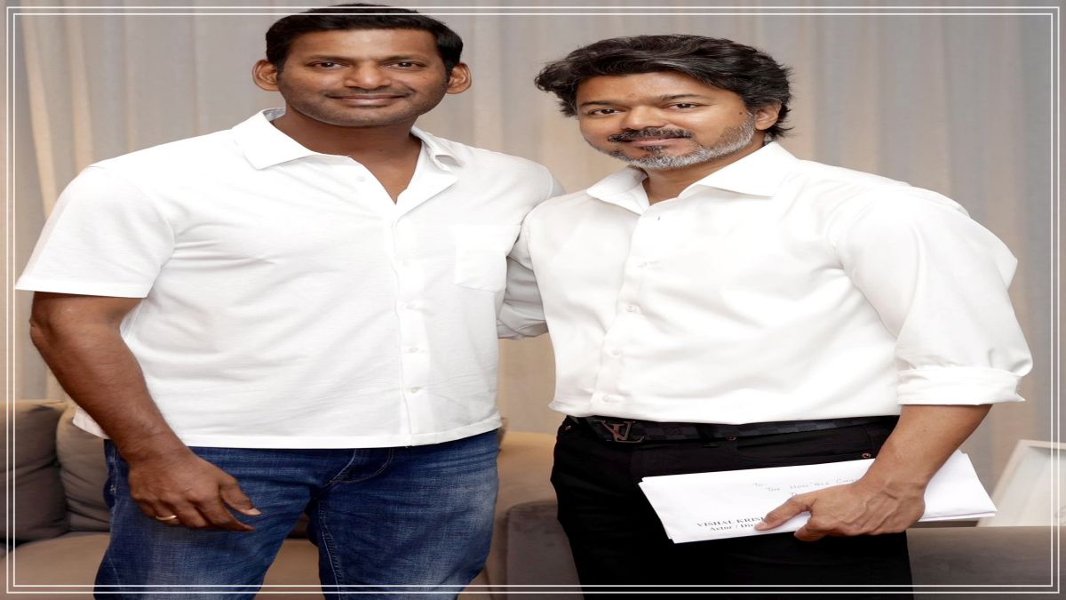 Actor Vishal meeting Tamil Nadu Chief Minister C Joseph Vijay warmly presenting the educational donation charts inside the Secretariat setup.