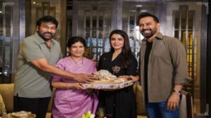 Megastar Chiranjeevi along with his wife Surekha gifting a traditional saree to actress Samantha and greeting director Raj Nidimoru for Maa Inti Bangaaram success.